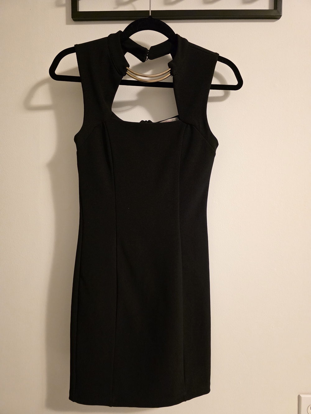 Chic Black Mini Dress with Gold Neck Accent